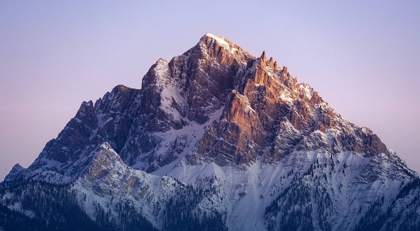 Photo of mountain with purple sky